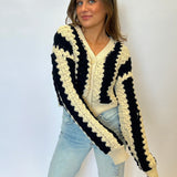 Steve Madden Lucas Cardigan — cozy V-neck sweater with three-button front and bold accent stripes for a modern, statement look.