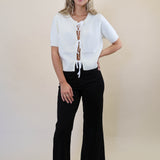 Steve Madden Sereia Cardigan in Cream styled with flared pants — elevated neutral outfit from Shear Boutique