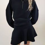 Steve Madden Rosina Skirt in Black styled with matching Rosina Sweater — chic coordinated look from Shear Boutique