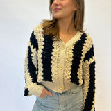 Chic Steve Madden Lucas Cardigan featuring a V-neckline, three buttons, and striking black and cream stripes for effortless everyday style.
