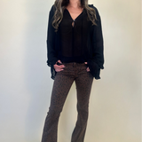 full length image of jacquel blouse paired with jaxtyn slim boot brown leopard pants/denim. Shear thairapy boutique fall clothing
