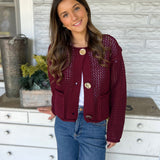 Women’s Dear John Red Sweater with oversized knit texture and three gold button accents for a chic, festive look.