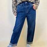 woman posing wearing kacey mid rise cuffed boyfriend jeans shear boutique