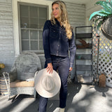 Thea Denim Shirt featuring two front pockets and a tailored fit — a versatile piece to wear solo or layered for effortless style.