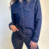 Women’s Thea Denim Shirt — soft wash denim with a relaxed yet refined silhouette, ideal over a tank or tee.