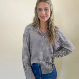 Blue and white plaid Z Supply River Button-Up Shirt with a relaxed fit, collared neck, front buttons, long sleeves, and one chest pocket—crafted from a soft, lived-in fabric.
