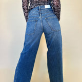 close up back view of caleb high rise relaxed stacked waist jeans from pistola on model - shear boutique