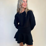 Steve Madden Rosina Skirt in Black styled with matching Rosina Sweater — chic coordinated look from Shear Boutique