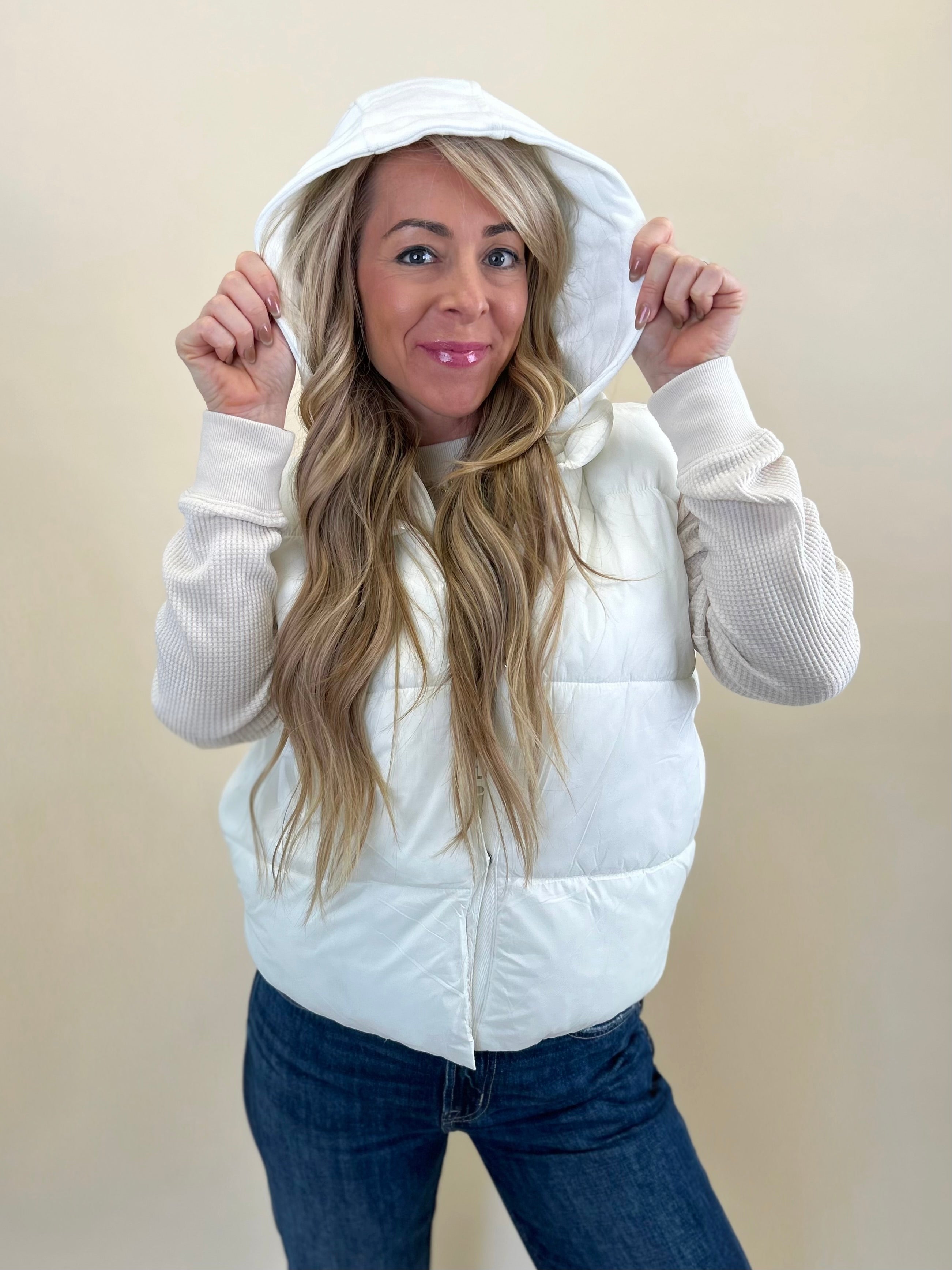 Lightweight white hooded puffer vest perfect for layering, from Z Supply at Shear Boutique.