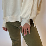 White Dear John Trenton Long Sleeve Shirt — cozy, soft material with flowing side slits and puff sleeves for stylish comfort on cool nights.