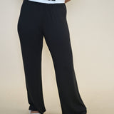 Elegant black wide-leg pants from Z Supply’s Luxe collection, designed with a relaxed drape and a dreamy, starry-inspired look.