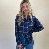 Z Supply River Plaid Shirt in soft-washed blue and white plaid, designed with a classic collar, long sleeves, button-down front, and a single chest pocket for a timeless look.