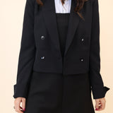 Chic black blazer by Steve Madden featuring a cropped length and modern double-breasted design