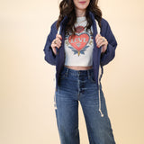 White cotton baby tee from Girl Dangerous with tattoo-inspired red heart “Love” motif