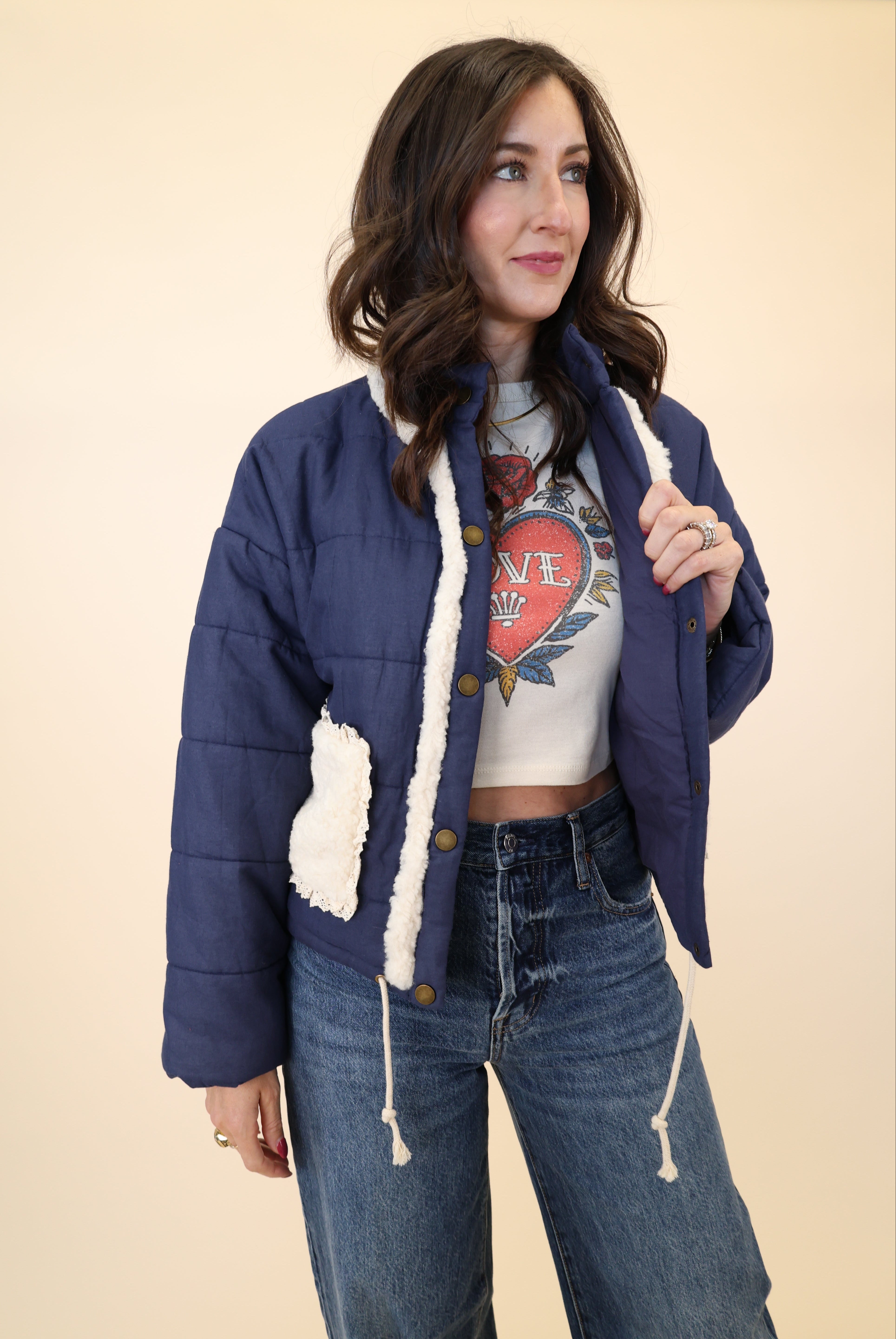 Miou Muse sherpa pocket quilted jacket in navy with warm texture and drawstring waist