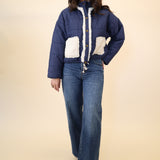 Miou Muse button-down quilted coat in navy with sherpa accents and adjustable hemline