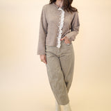 Charming beige cardigan by Miou Muse — soft texture with elegant lace-trimmed accents