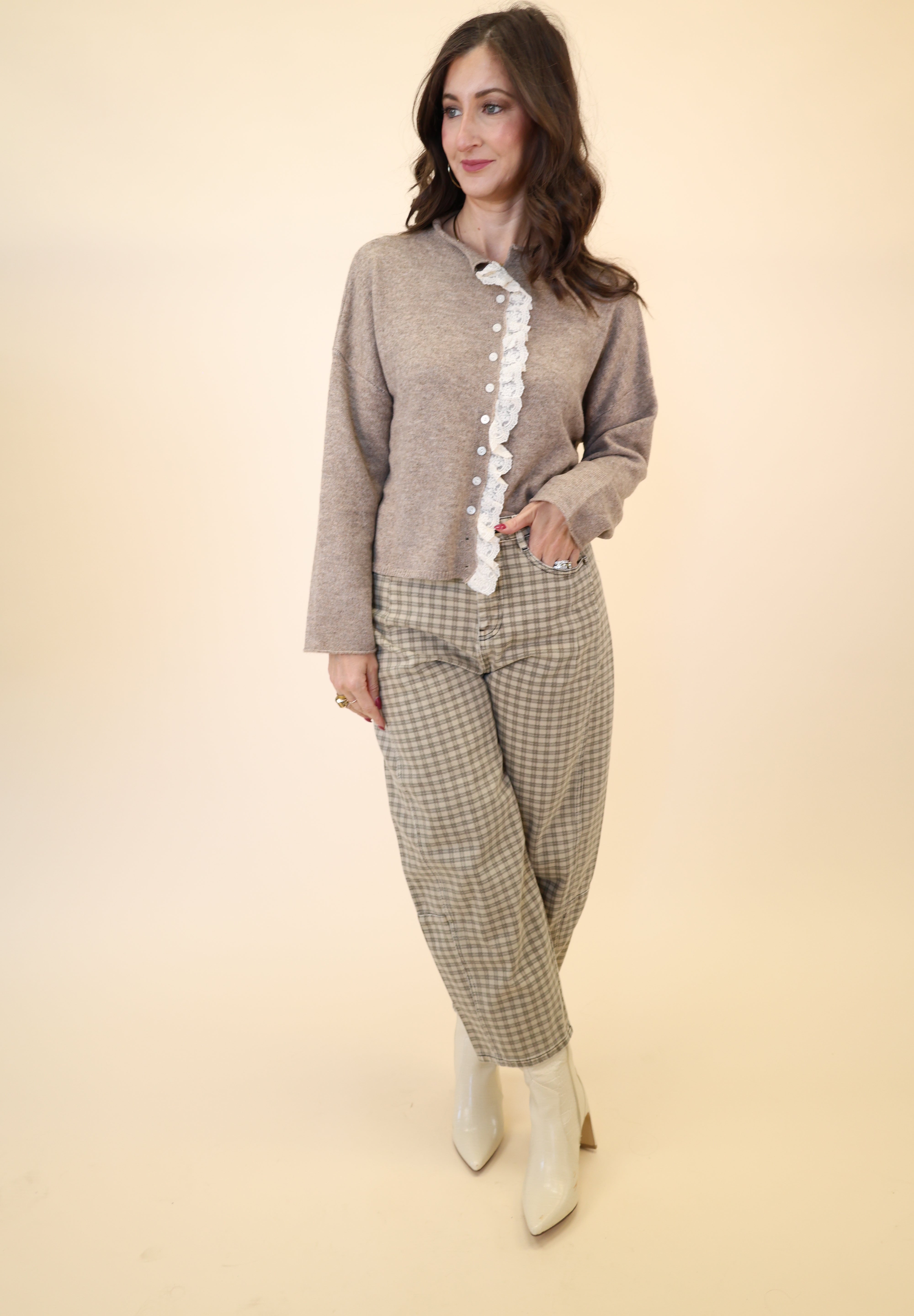 Charming beige cardigan by Miou Muse — soft texture with elegant lace-trimmed accents