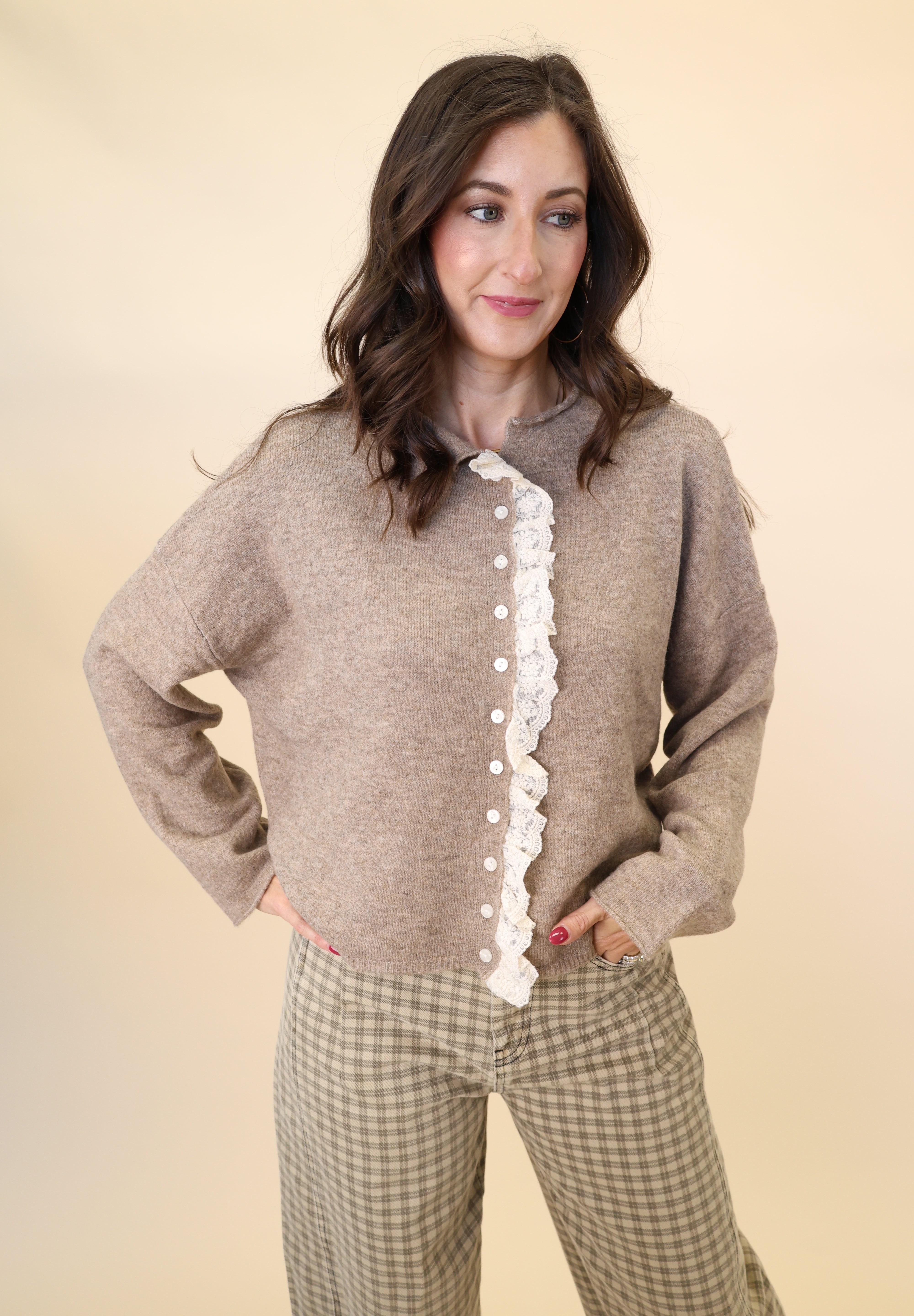 Soft beige Miou Muse cardigan with feminine frilled edges and lace-trimmed front
