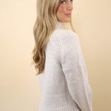 Z Supply Emerge white knit sweater featuring a soft funnel neckline and relaxed silhouette