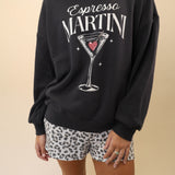 Black long sleeve oversized sweatshirt by Z Supply featuring playful Espresso Martini design