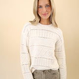 Chic white cable-knit crewneck sweater from Z Supply with soft, relaxed drape