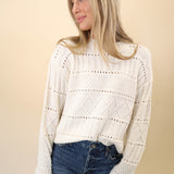 Soft white crewneck sweater by Z Supply featuring cozy cable-knit texture and easy silhouette