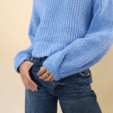 Lightweight blue chunky knit sweater by Z Supply featuring cropped fit and voluminous sleeves
