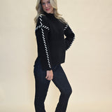 Love Token Spencer Sweater in Black styled with denim — casual chic outfit from Shear Boutique