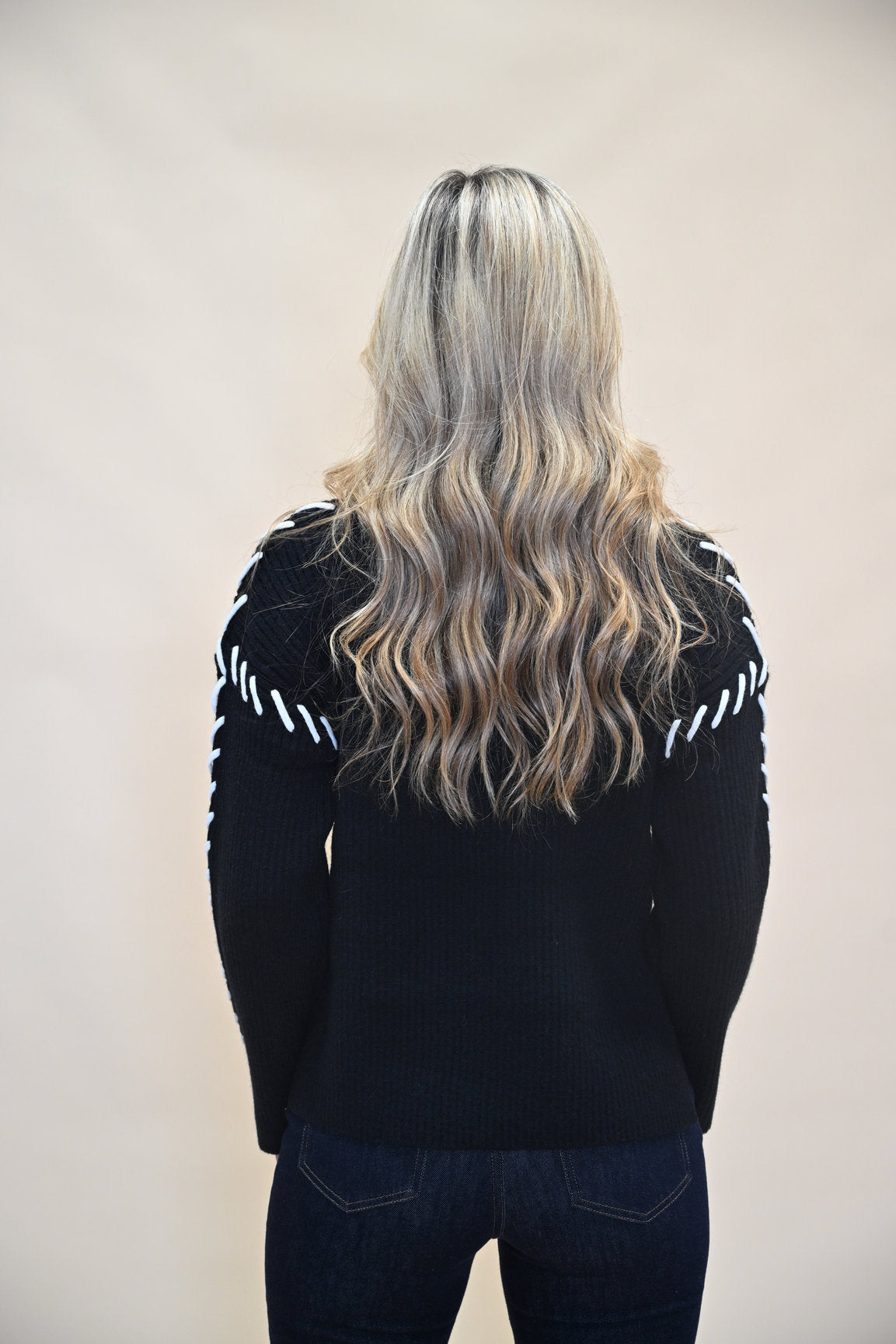 Back view of Love Token Spencer Sweater in Black — ribbed knit detail from Shear Boutique