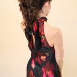 Fitted sleeveless satin dress by Steve Madden with soft blurry floral print and smooth sheen.