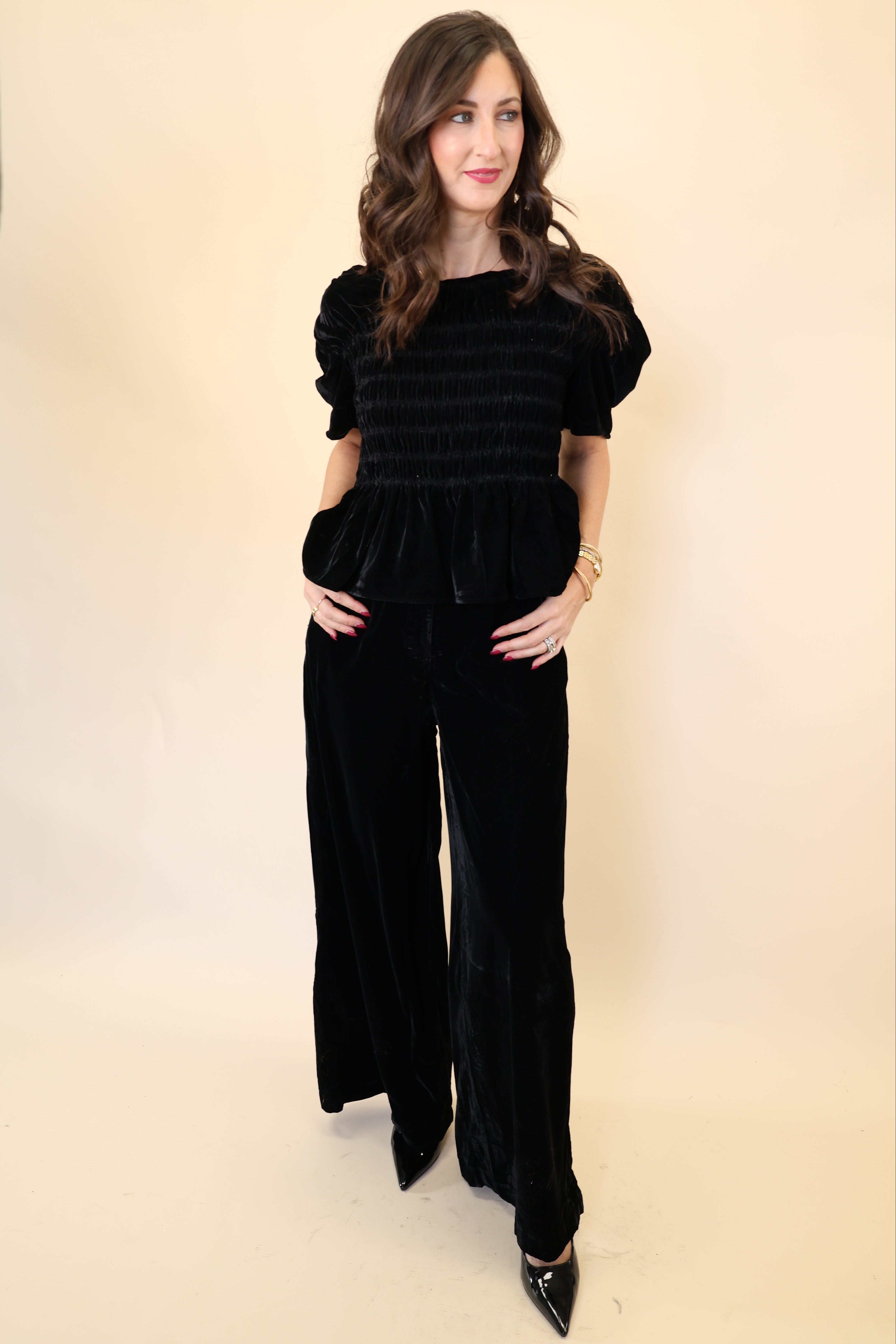 Black velvet wide leg pants from Deluc featuring soft drape and relaxed fit.