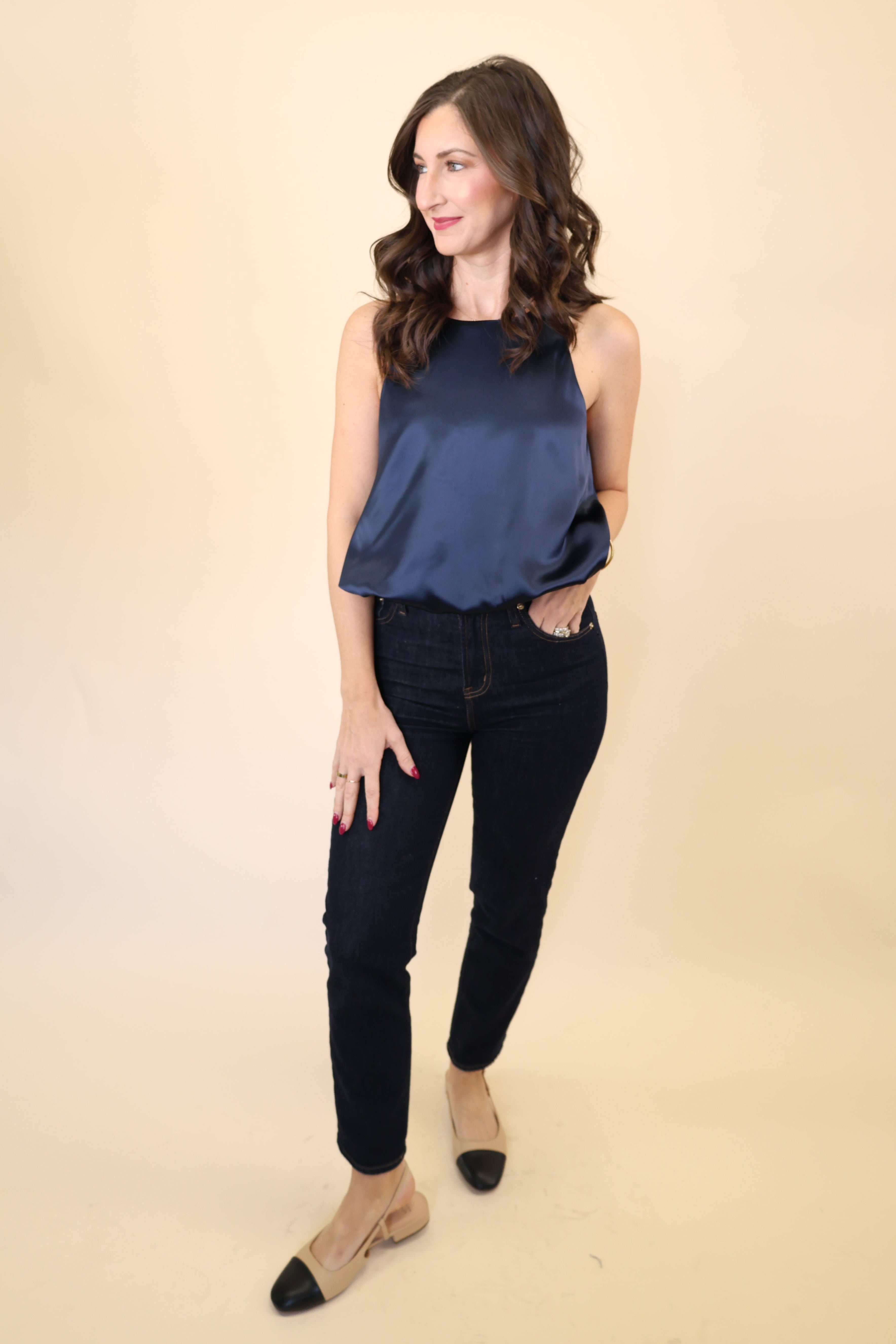 Front view of Deluc navy satin tank top showcasing bloused cropped fit and smooth sheen.