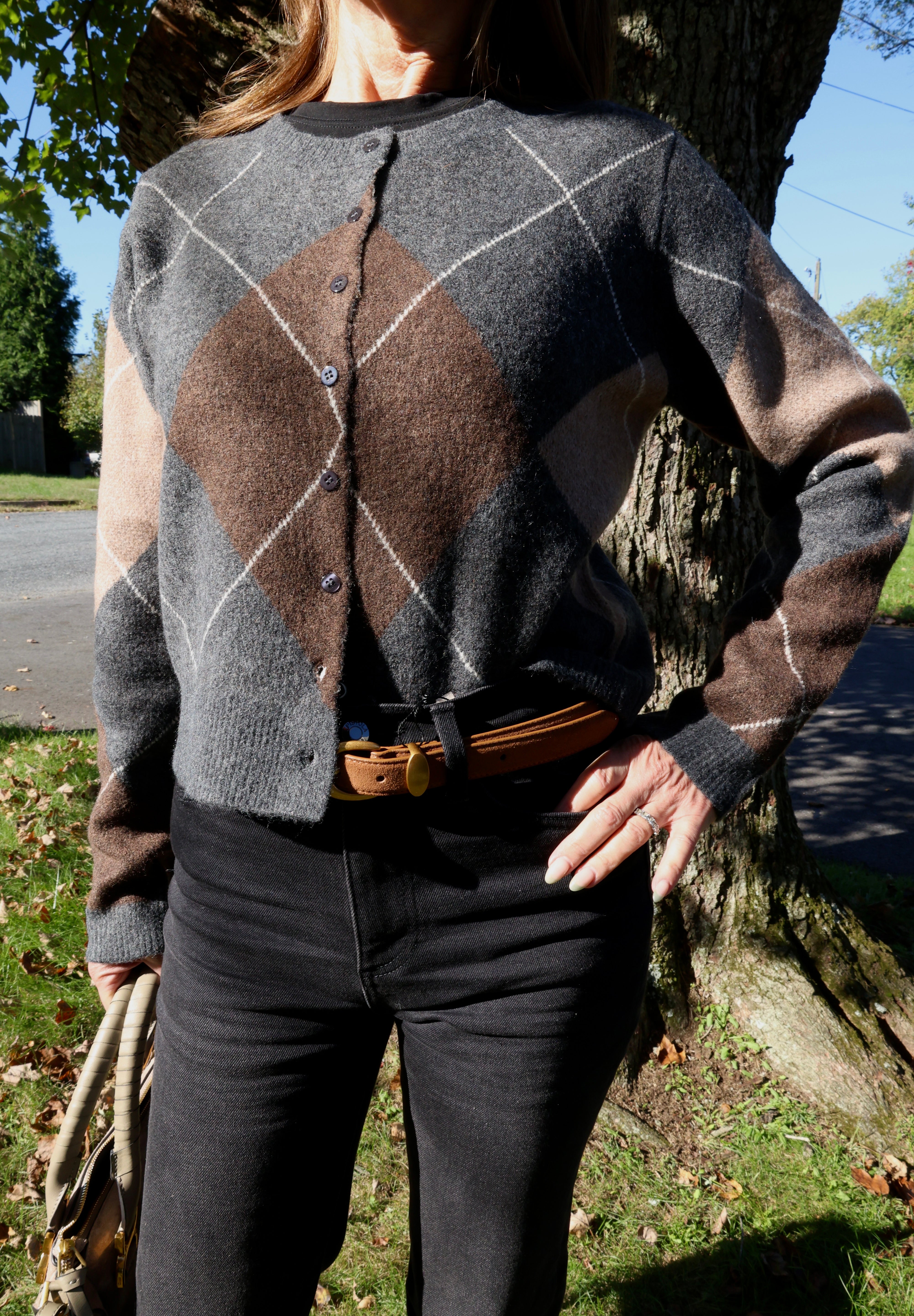 Women’s classic argyle cardigan with preppy-inspired pattern and cozy knit at Shear Boutique Olney