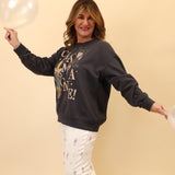 Z Supply Celebrate Sunday sweatshirt with a “champagne” graphic, soft brushed fleece, crewneck, and long sleeves.