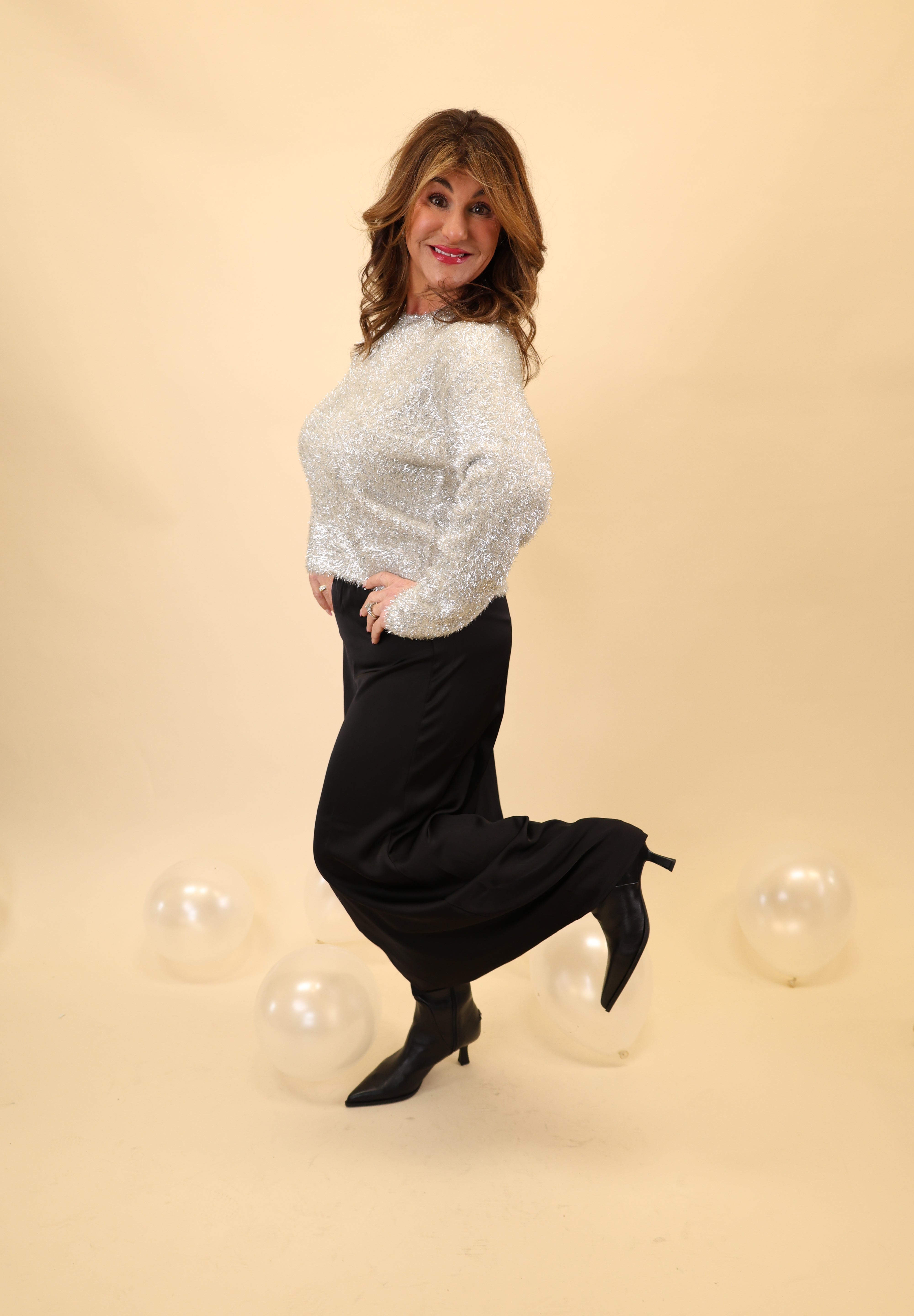 Z Supply Tinseltown Sweater featuring a lightweight sparkly knit with a crew neck, long sleeves, and a cozy pullover design.