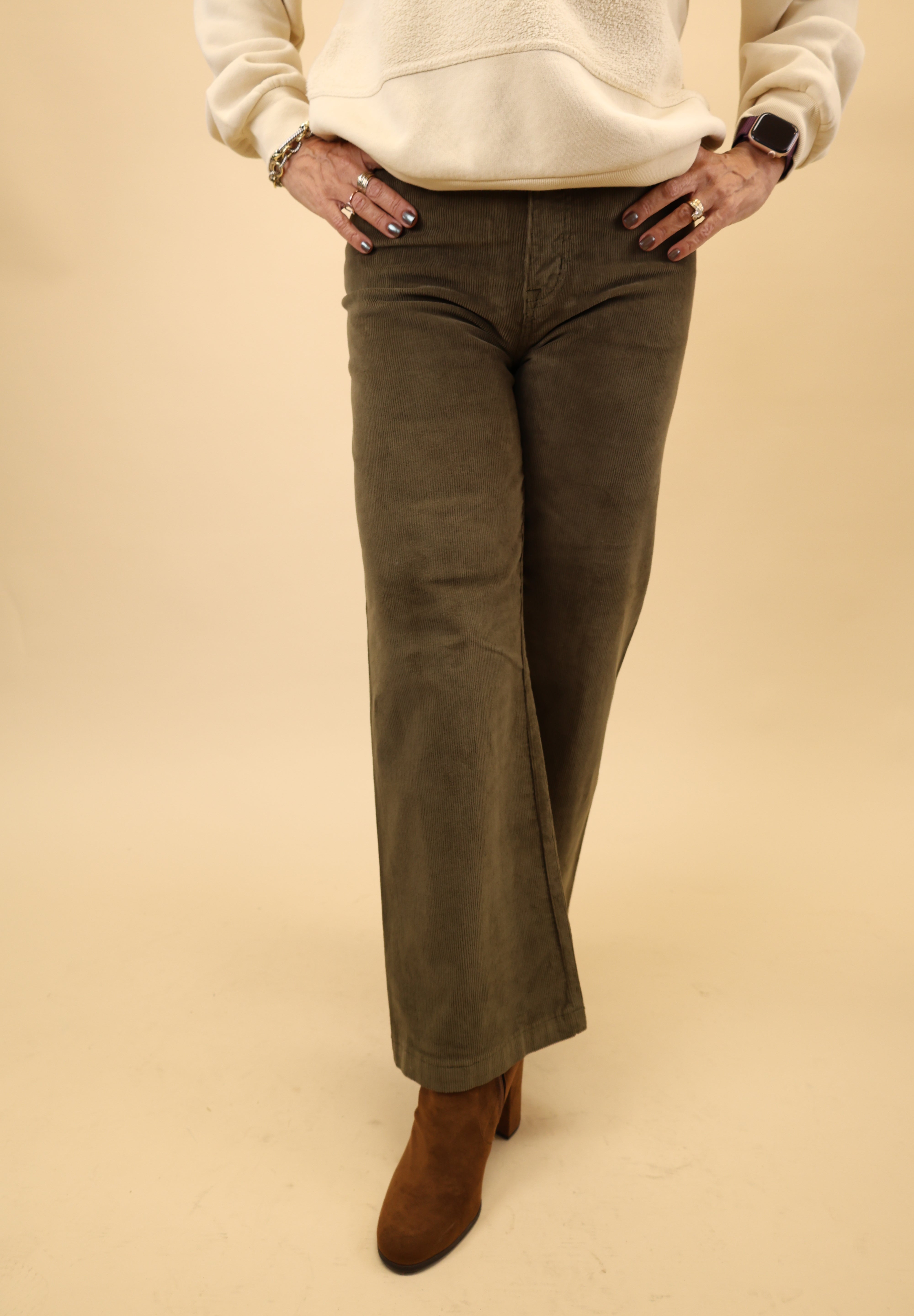 Wide-leg olive green Pistola Penny crop jeans made from vintage-inspired denim with a high-rise silhouette.
