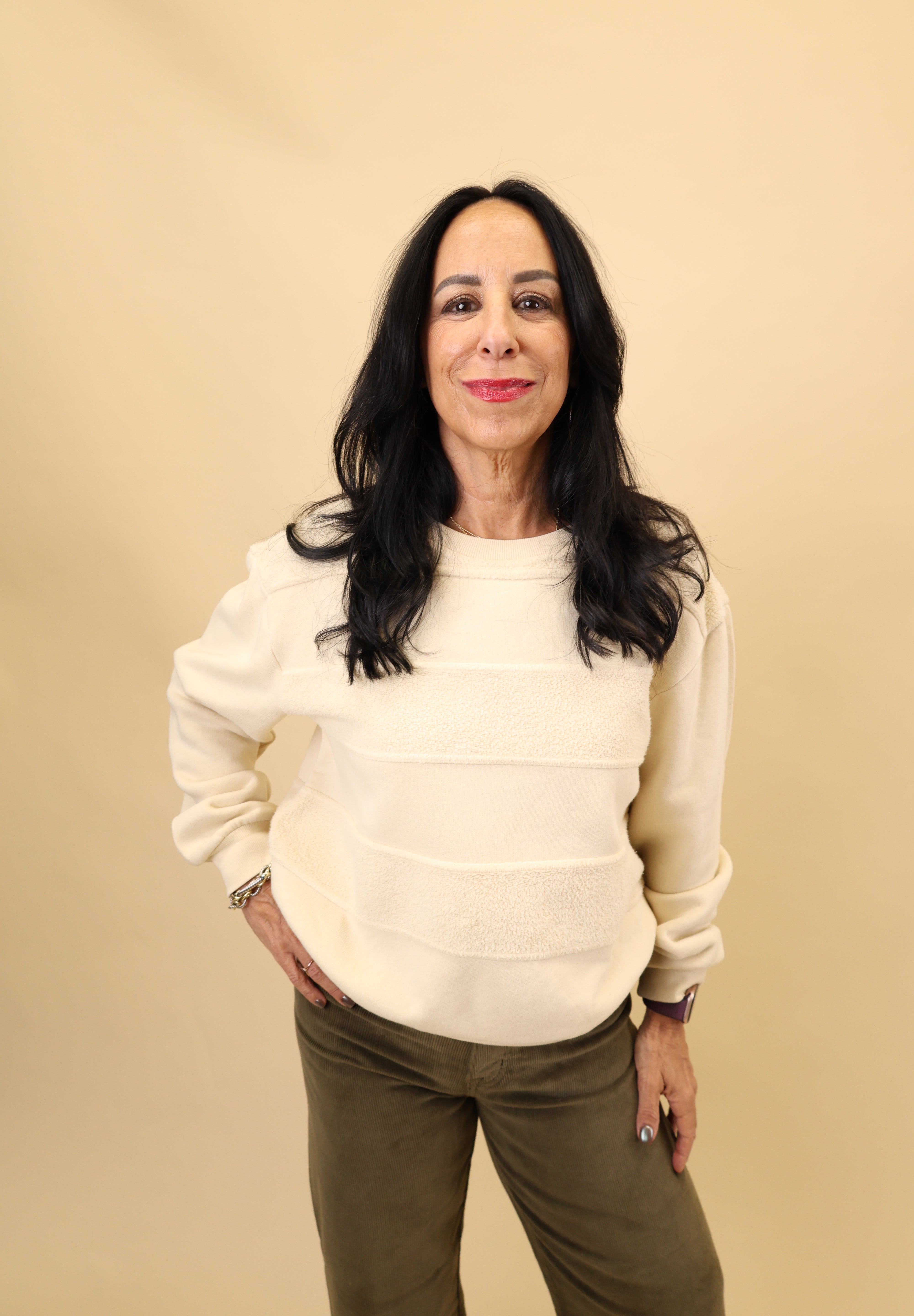 Lula Sweatshirt by Dear John in cream showcasing soft material and subtle horizontal textured striping.