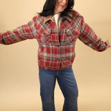 Sherpa-lined red plaid jacket by Dear John with long sleeves, button-front design, front welt pockets, and a fitted cuffed waistband.