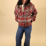Dear John Owen Trucker Jacket in red plaid with sherpa lining, button-front closure, long sleeves, front welt pockets, and cuffed waistband.