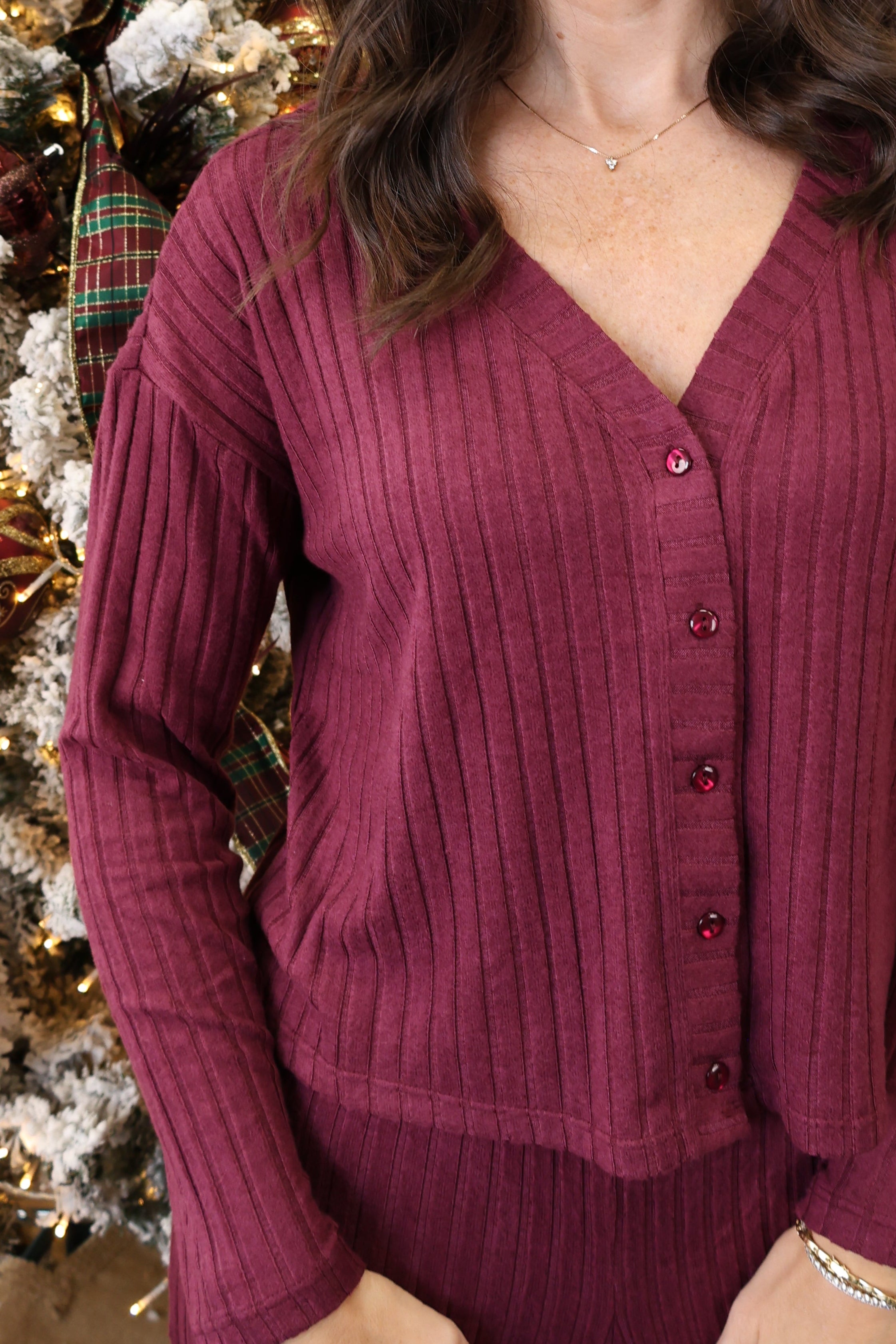 Close-up of Z Supply Mara Rib Cardigan showing ribbed texture, button detail, and soft stretch fit.