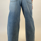 Light wash Pistola Sydney jeans featuring high rise fit and bowed wide leg shape