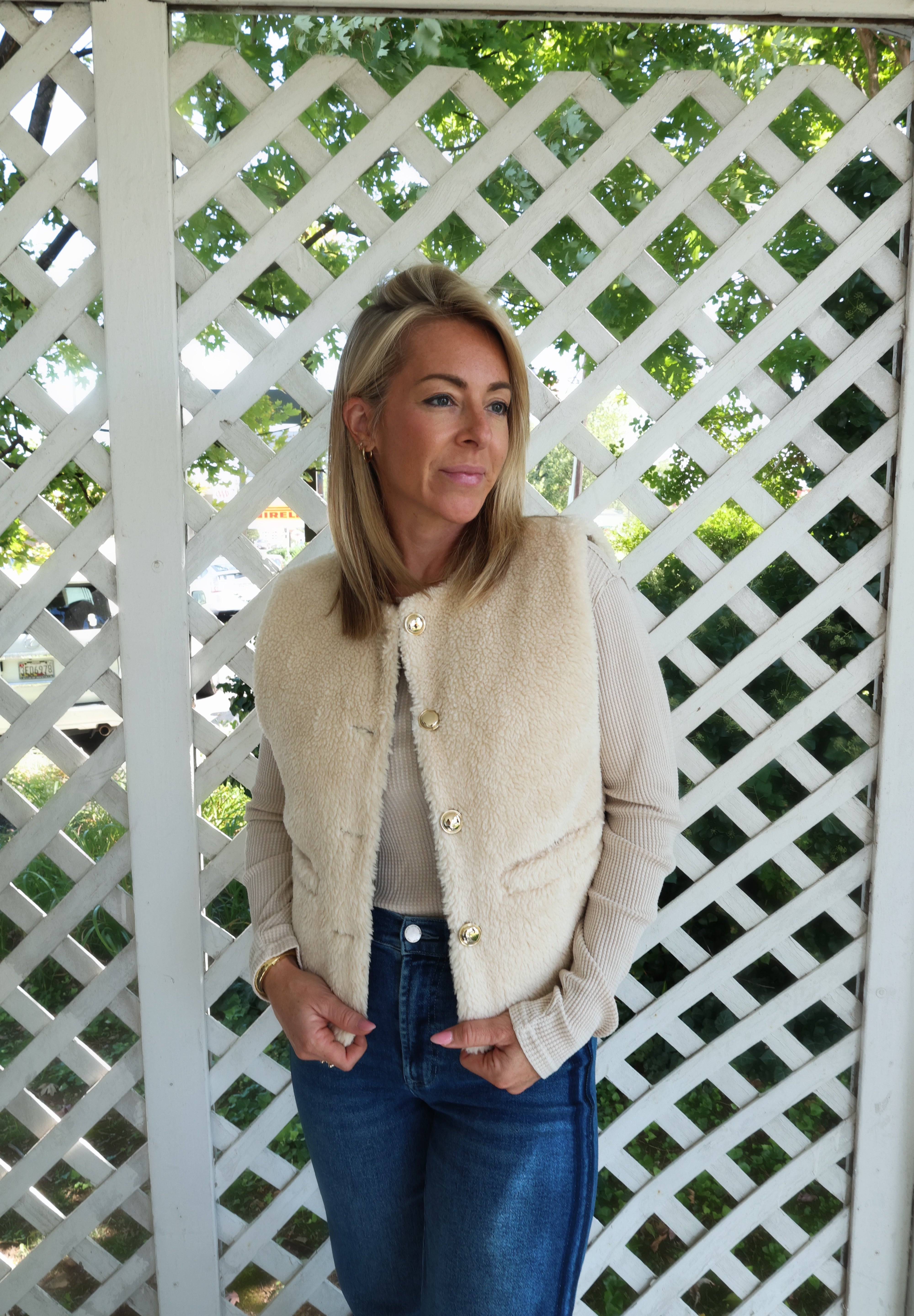 Jam reversible vest for women in army green with quilted and faux shearling sides