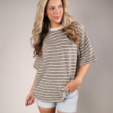 Brown striped Free People All Love pocket t-shirt with crew neckline and front chest pocket detail.