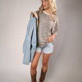 Brown Free People stripe pocket tee with horizontal lines and vintage-inspired relaxed shape.