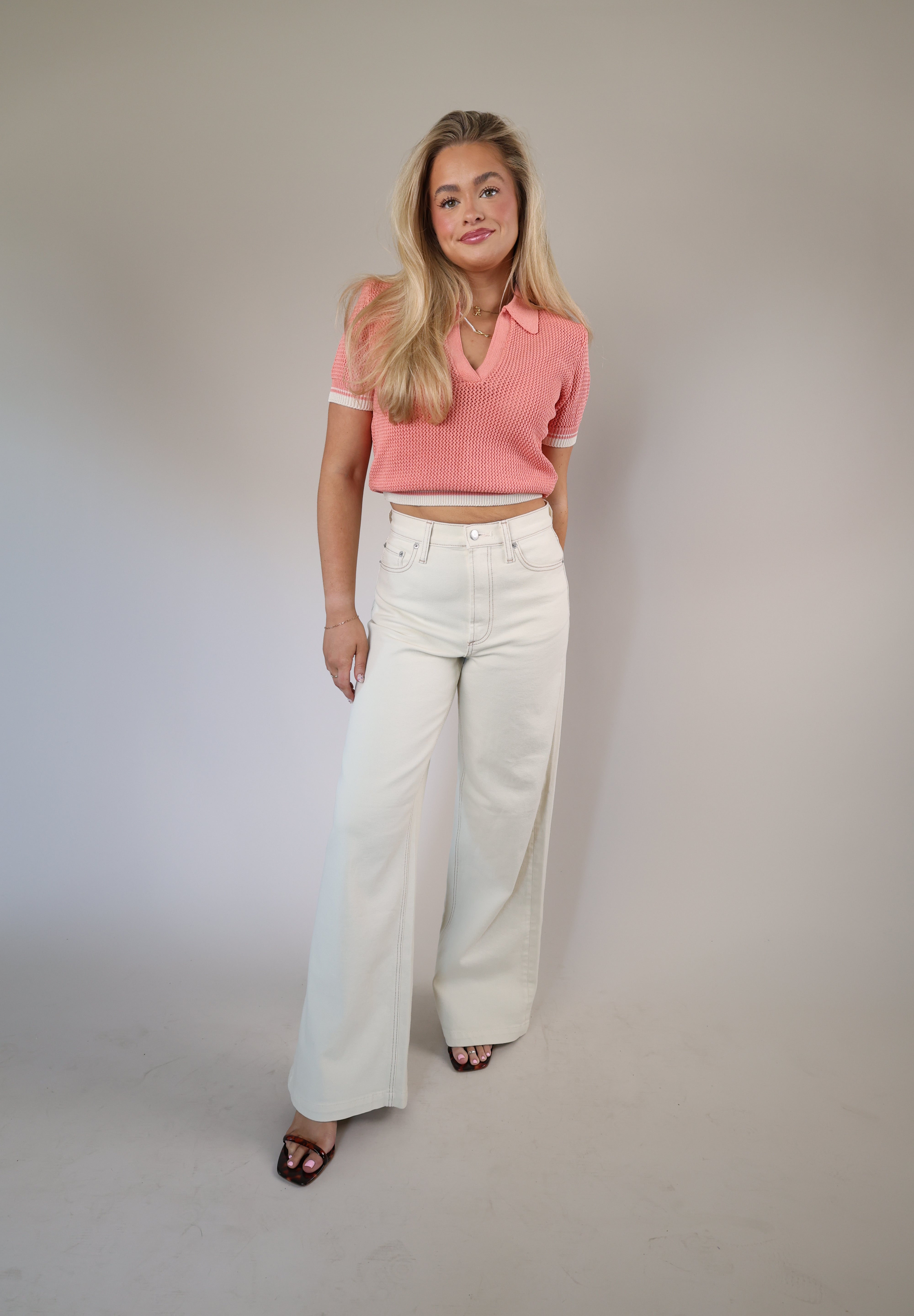 Steve Madden Aspen top in soft pink, designed with a cropped silhouette, short sleeves, and a classic Johnny collar neckline.