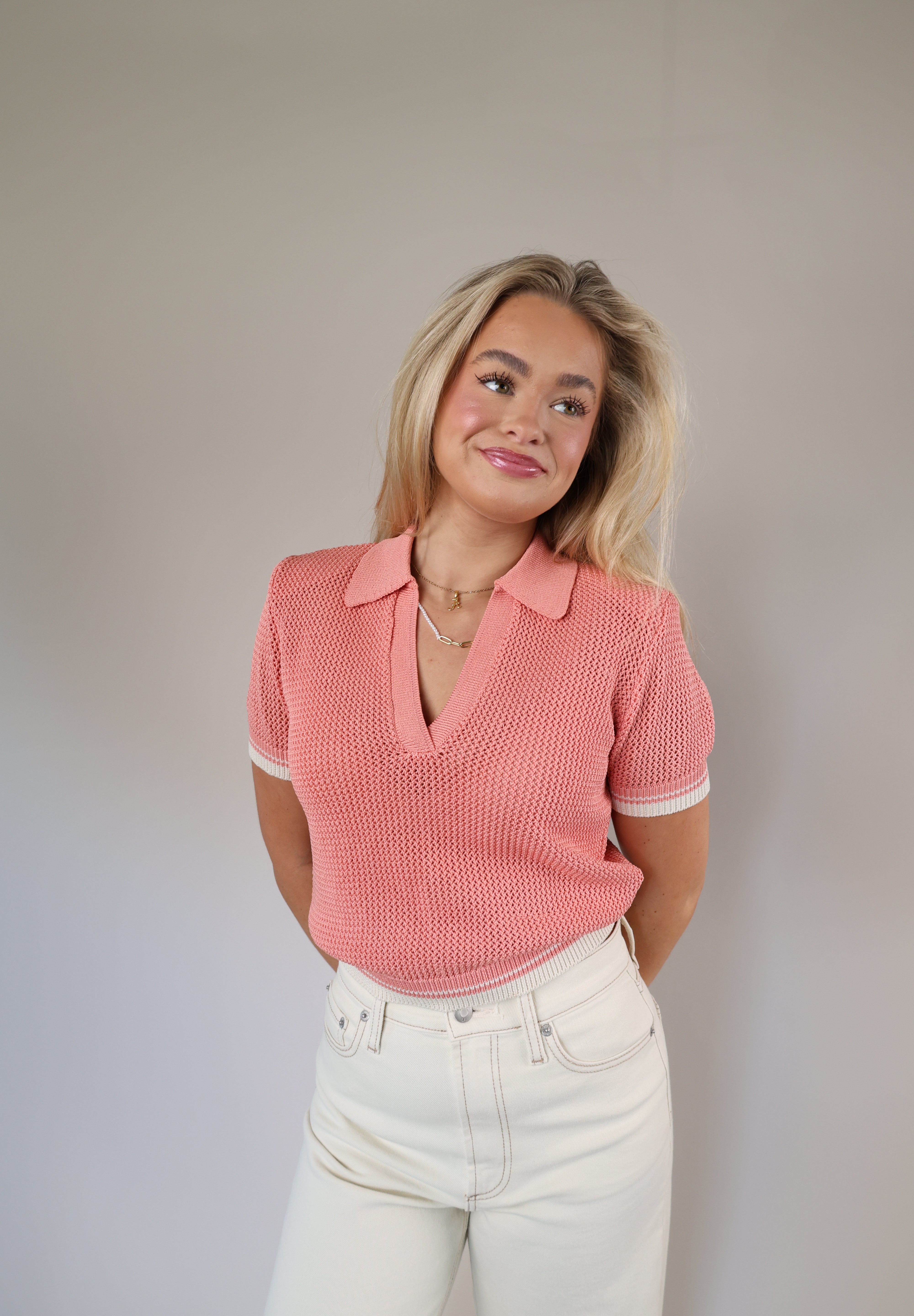 Pink Steve Madden Aspen sweater top with a cropped fit, short sleeves, and a stylish Johnny collar.