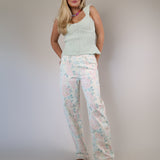 Floral wide leg denim jeans in peach beige by Steve Madden