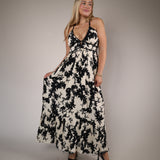 Shear Boutique Spring 2026 Athena Maxi Dress ivory floral tiered maxi dress with black trim elegant flowy silhouette