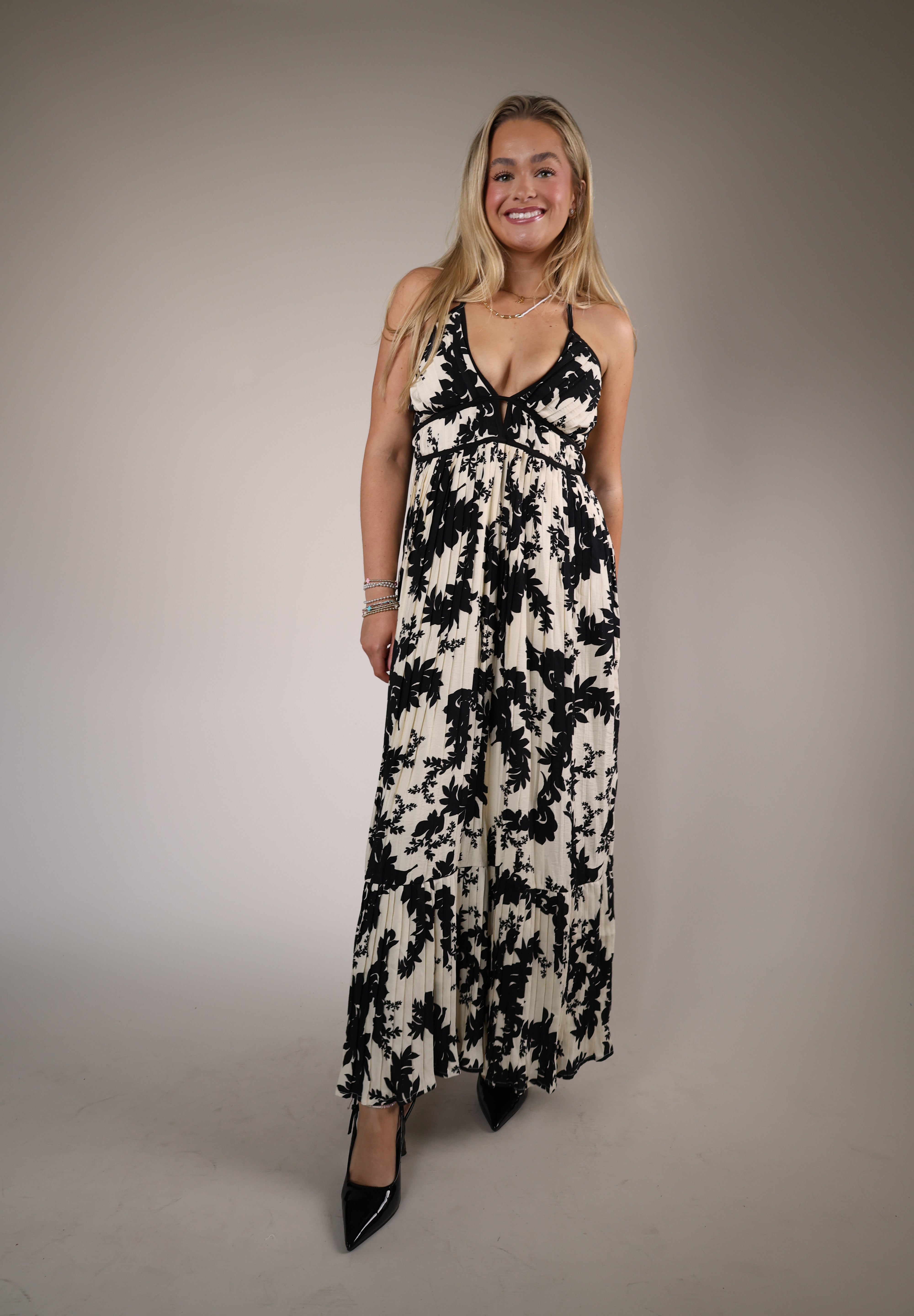 Athena Maxi Dress Shear Boutique spring collection 2026 ivory and black floral maxi dress flowy tiered skirt